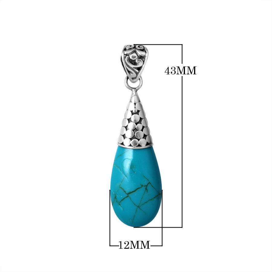 Sterling silver teardrop pendant featuring turquoise shell with polished dotted cap handcrafted in Bali.