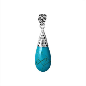 Sterling silver teardrop pendant featuring turquoise shell with polished dotted cap handcrafted in Bali.