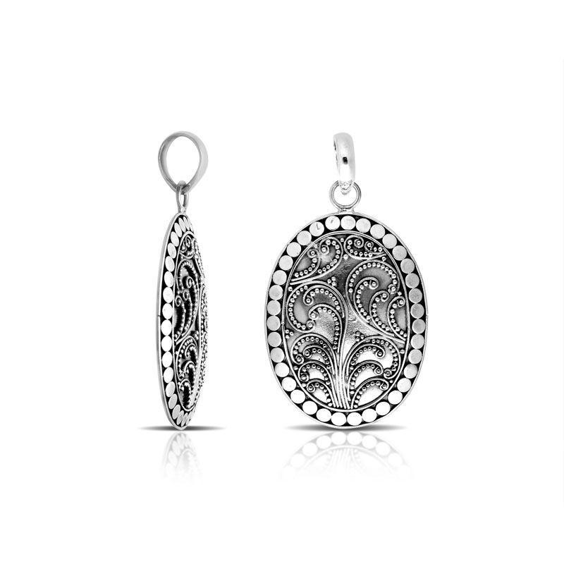 Sterling silver oval pendant with swirl filigree pattern and oxidized Balinese handcrafted detailing.