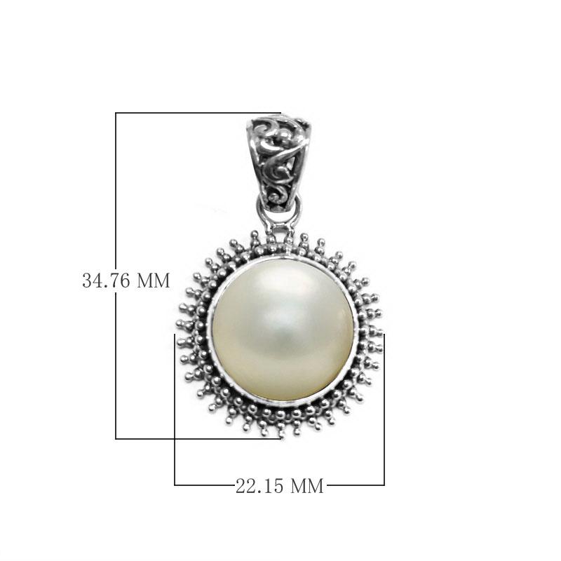 Sterling silver round pendant with Mabe Pearl and oxidized Balinese beaded handcrafted frame.