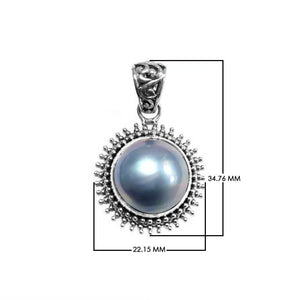 Sterling silver round pendant with gray Mabe Pearl and oxidized Balinese handcrafted beaded frame.