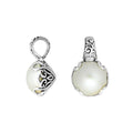Sterling silver Mabe Pearl pendant with Balinese filigree and polished finish.