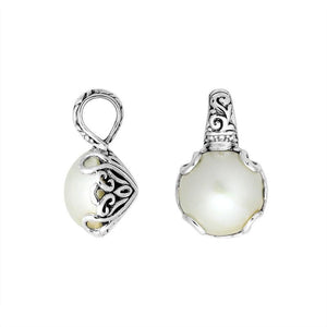 Sterling silver Mabe Pearl pendant with Balinese filigree and polished finish.