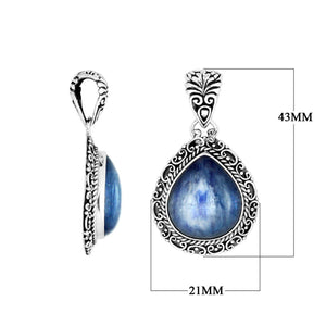 Sterling silver Kyanite teardrop pendant with ornate Balinese frame.
