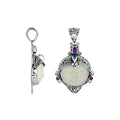 Sterling silver Bone Face pendant with multi-colored quartz accents.