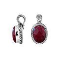 Sterling silver pendant featuring an oval Ruby Quartz set in a carved Balinese patterned frame with polished shine.