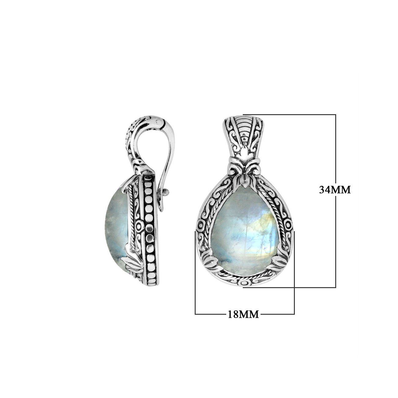 Sterling silver pendant featuring a teardrop Rainbow Moonstone set in a carved Balinese frame with a polished glossy finish.