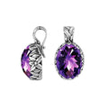 Sterling silver oval-shaped Amethyst Quartz pendant with floral detailing and enhancer bail, polished for brilliance, ideal for wholesale jewelry catalogs and distributors.