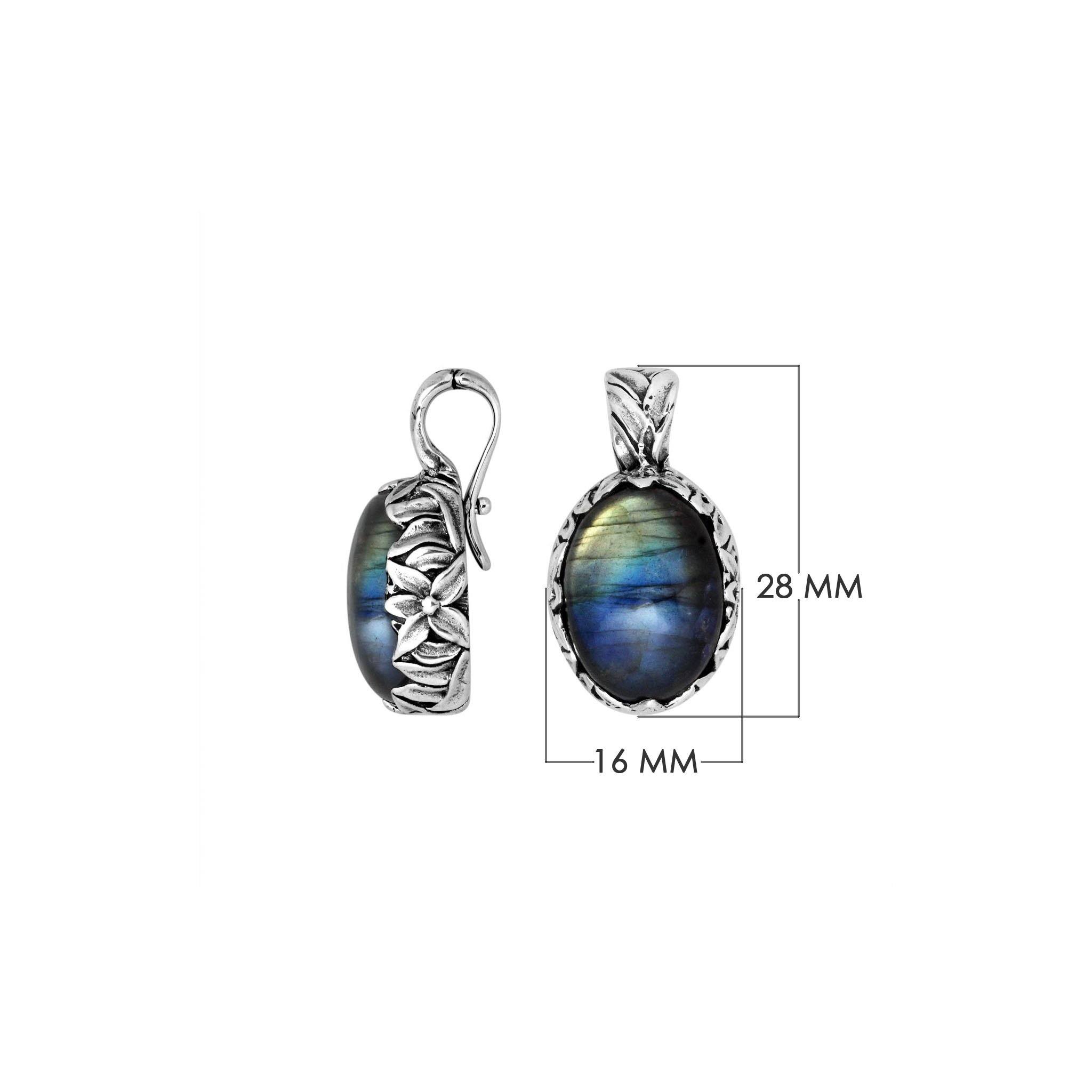 Sterling silver oval pendant featuring Labradorite framed with detailed Balinese floral engraving.