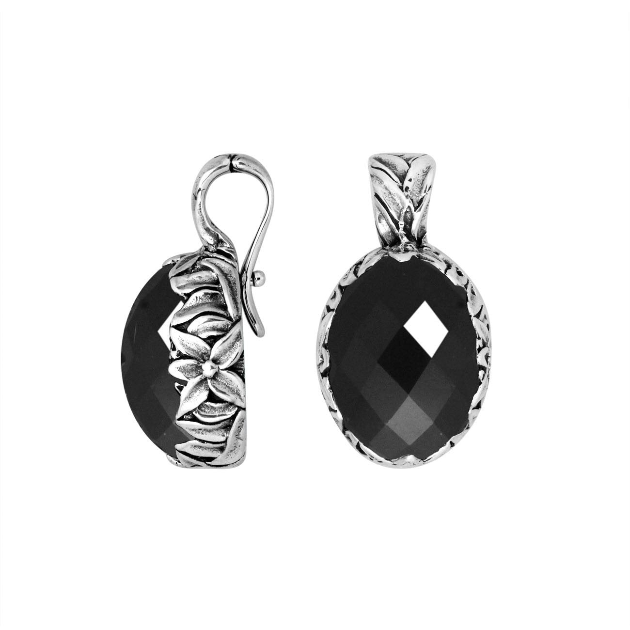 Sterling silver oval pendant featuring faceted Black Onyx with detailed Balinese floral engraving.