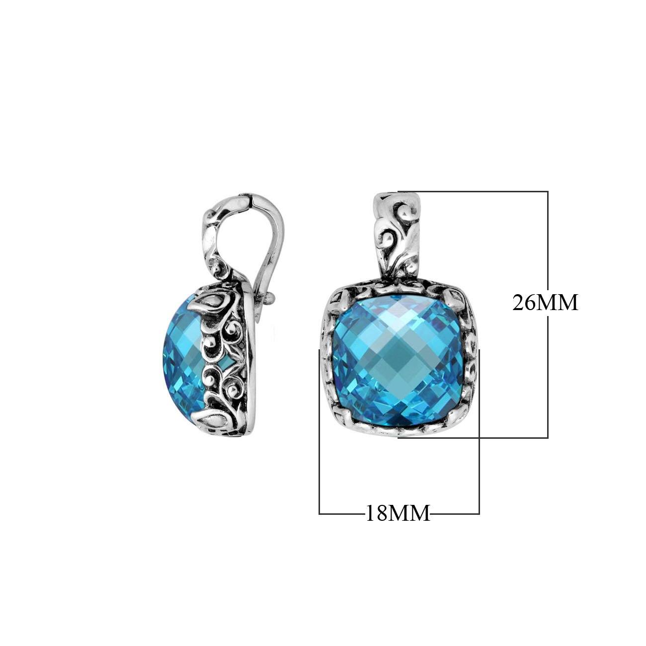 Sterling silver cushion pendant featuring Blue Topaz Quartz with detailed Balinese scroll engraving.