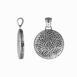 Sterling silver round pendant featuring a hammered texture design with polished edges and classic Balinese detailing suitable for refined catalogue presentation.