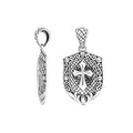 Sterling silver shield-shaped pendant featuring an engraved cross design with textured lattice background and decorative border suitable for classic wholesale jewelry collections