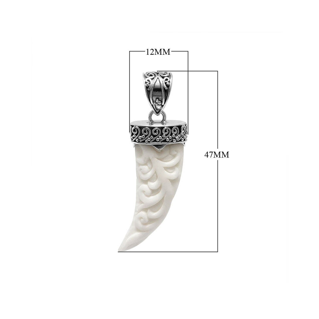 Sterling silver carved bone horn pendant featuring decorative Balinese patterned cap with polished finishing suitable for classic wholesale jewelry collections