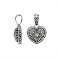 Sterling silver heart pendant with diamond and 18K gold detailing in ornate design.