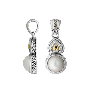 Teardrop silver pendant with pearl, gold details, and diamond accents