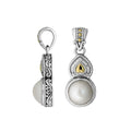 Teardrop silver pendant with pearl, gold details, and diamond accents
