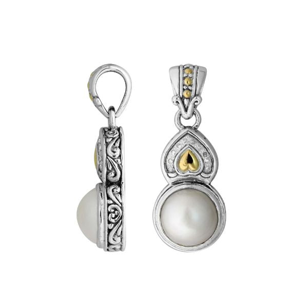 Teardrop silver pendant with pearl, gold details, and diamond accents