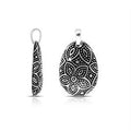 A wholesale Silver Overlay Over Copper pendant featuring oxidized floral etching, dotted detailing, polished overlay texture, and traditional Balinese artistry ideal for bulk jewelry purchasing.