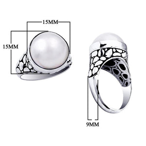 Wholesale sterling silver ring with luminous white Mabe Pearl and pebble-pattern design – handcrafted artisan jewelry for bulk resellers.