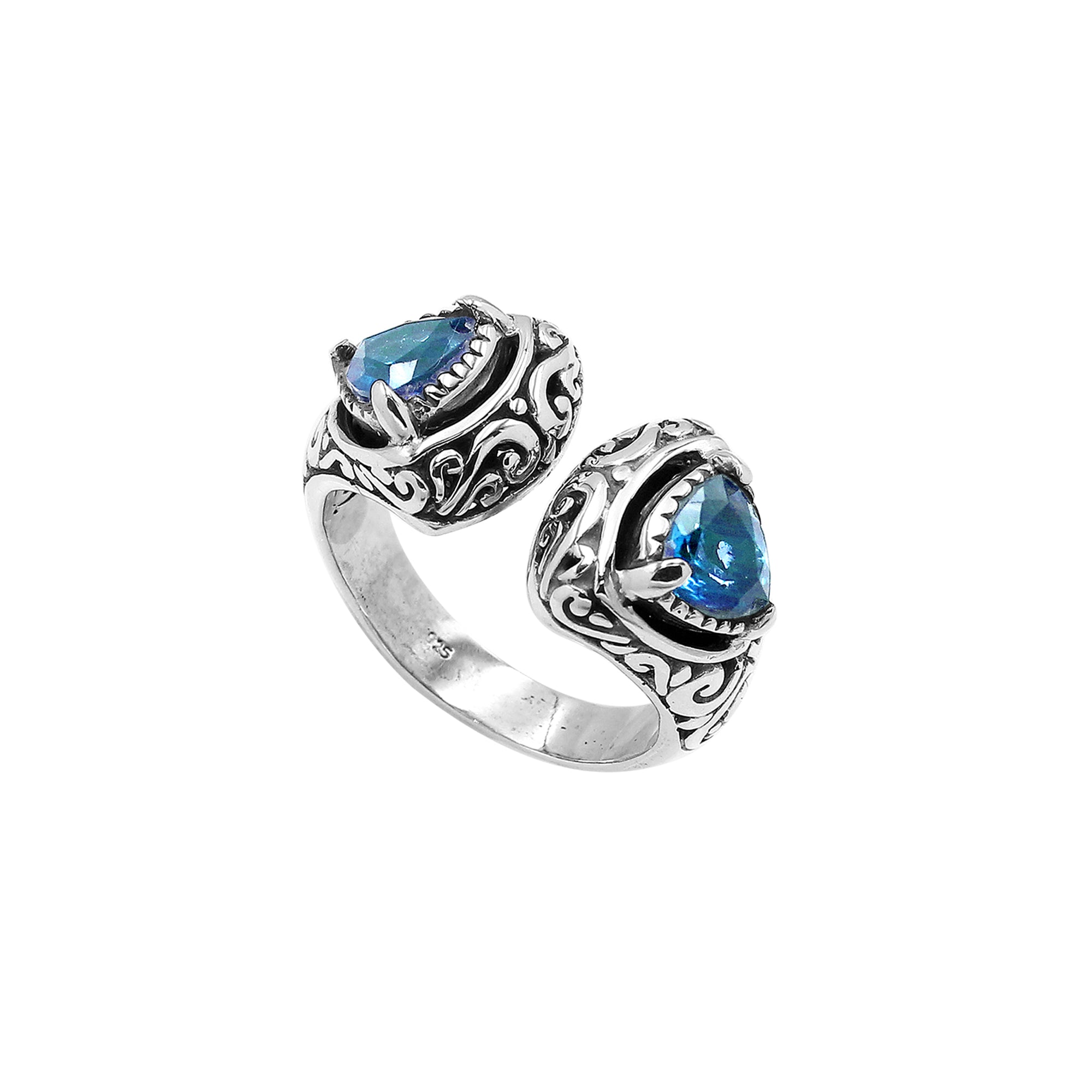 Wholesale sterling silver Bali design ring with trillion-cut Blue Topaz Quartz– handcrafted artisan wholesale jewelry.