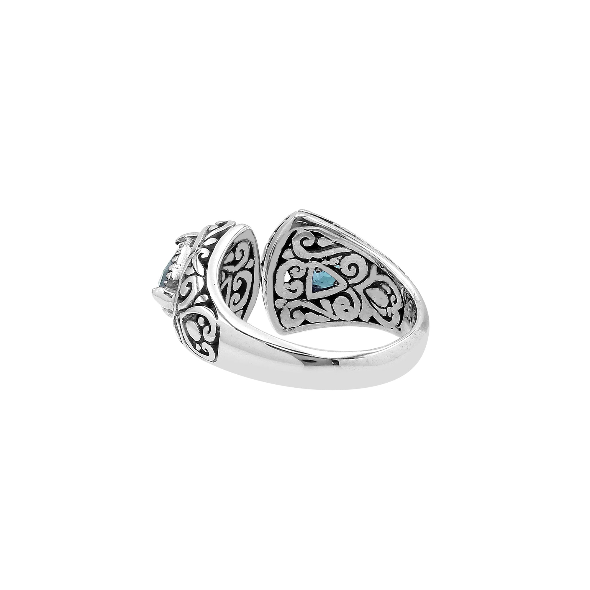 Wholesale sterling silver Bali design ring with trillion-cut Blue Topaz Quartz– handcrafted artisan wholesale jewelry.