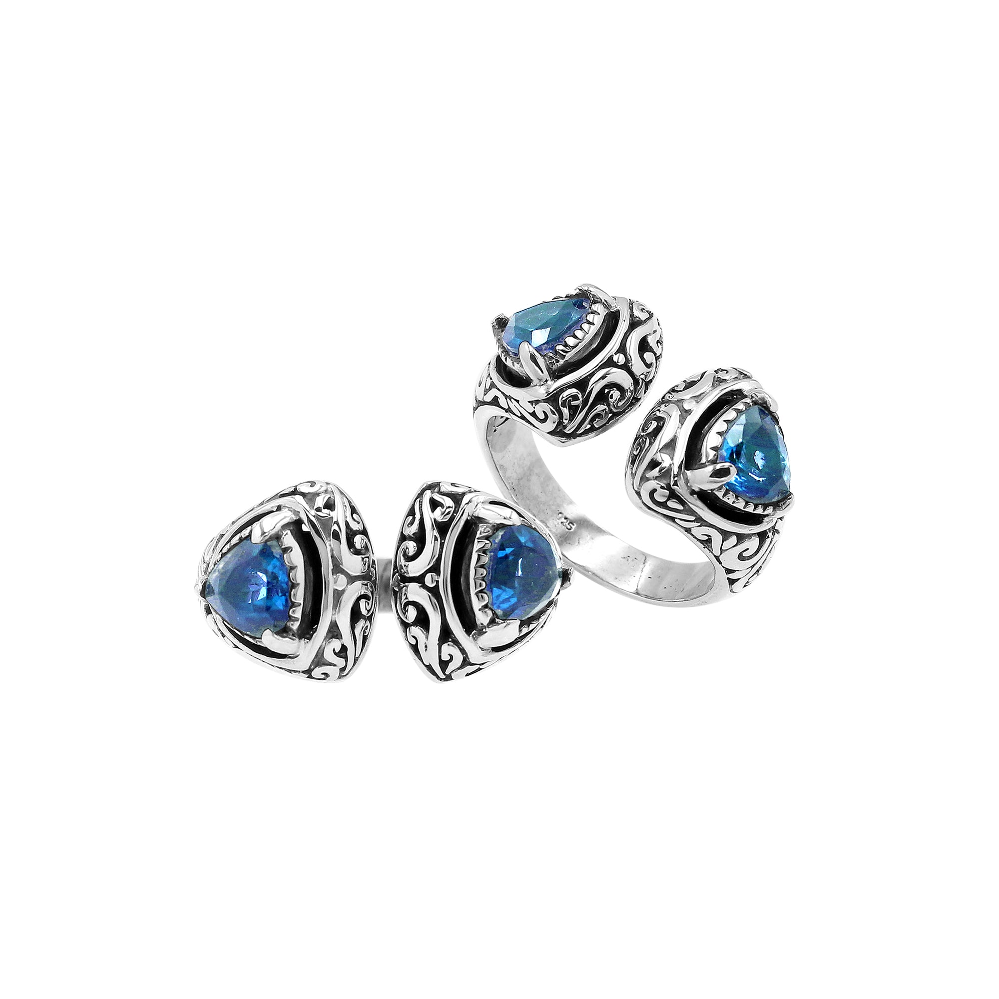 Wholesale sterling silver Bali design ring with trillion-cut Blue Topaz Quartz– handcrafted artisan wholesale jewelry.
