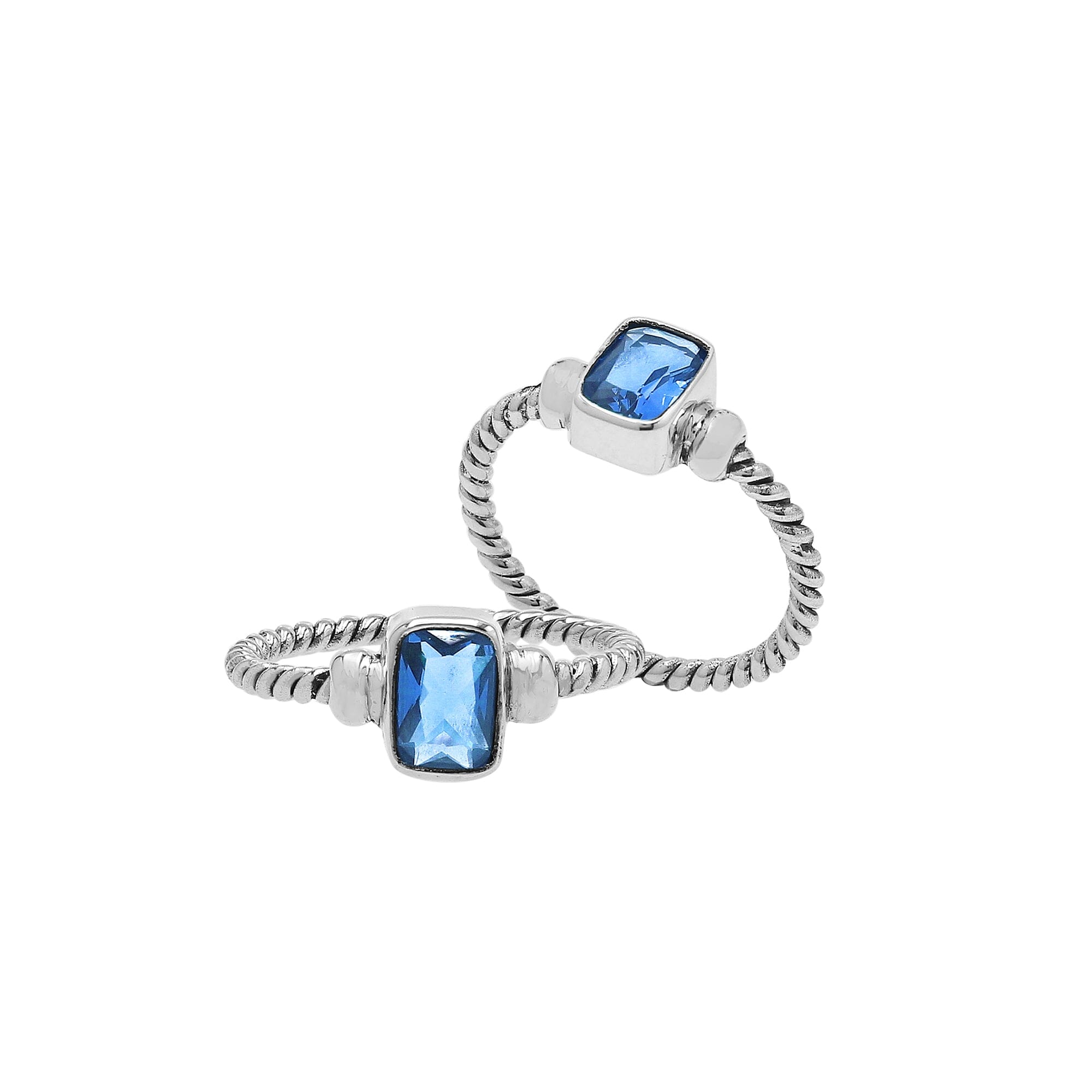 Wholesale sterling silver twisted band ring with rectangular-cut Blue Topaz Quartz, handcrafted artisan jewelry in bulk for retailers and resellers.