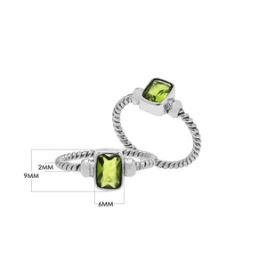 Wholesale sterling silver twisted band ring with rectangular-cut Peridot Quartz, handcrafted artisan jewelry in bulk for retailers and resellers.