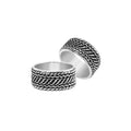Wholesale sterling silver wide band ring with diagonal braided Bali-inspired design and oxidized details, handcrafted unisex artisan jewelry in bulk for retailers and resellers.
