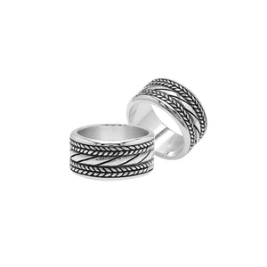 Wholesale sterling silver wide band ring with diagonal rope Bali-inspired design and oxidized details, handcrafted unisex artisan jewelry in bulk for retailers and resellers.