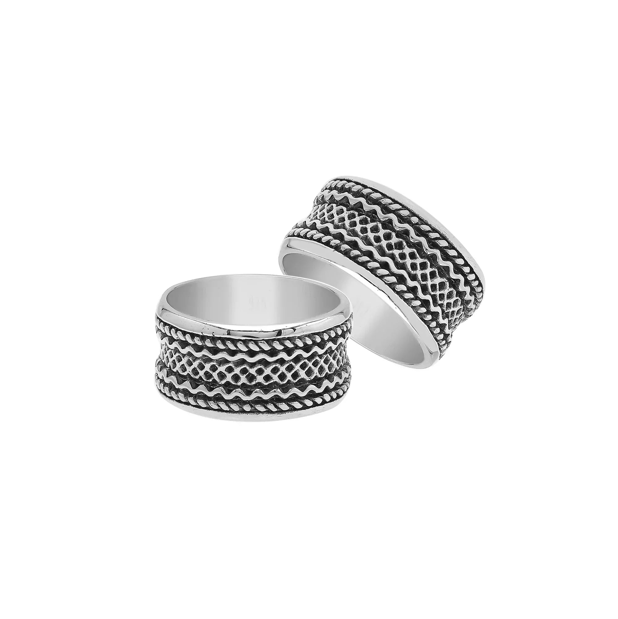 Wholesale sterling silver wide band ring with intricate tribal Bali design, handcrafted in 925 silver with oxidized detailing for jewelry retailers and bulk buyers.