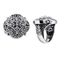 Wholesale sterling silver Balinese statement ring with ornate floral medallion design, oxidized detailing, and handcrafted scroll patterns – artisan jewelry from Bali.