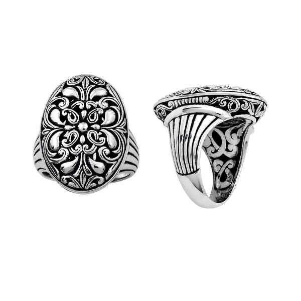 Sterling silver oval floral signet ring in bulk wholesale, handcrafted in Bali with oxidized finish and detailed scrollwork design.