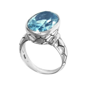 Sterling silver wholesale ring with oval Blue Topaz Quartz and textured carved band, handcrafted in Bali.