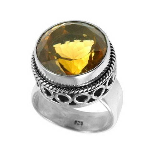 Wholesale sterling silver citrine ring with faceted golden Quartz, twisted rope bezel, and cutout band detailing – handcrafted Balinese artisan jewelry.
