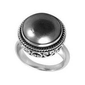 Wholesale sterling silver hematite ring with polished cabochon stone, rope bezel, and Balinese scroll detailing – handcrafted artisan jewelry from Bali.