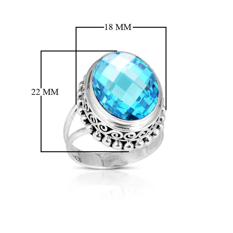 Wholesale sterling silver ring with faceted oval Blue Topaz Quartz, Balinese scroll and bead design – bulk handcrafted statement jewelry.