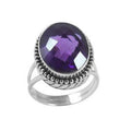 Wholesale sterling silver ring with faceted oval Amethyst Quartz, Balinese beaded border design – bulk handcrafted statement jewelry.