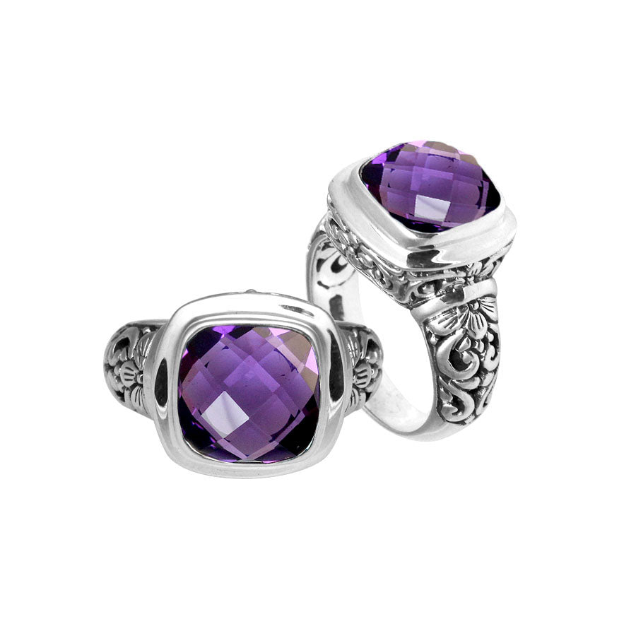 Sterling silver ring with cushion-cut Amethyst Quartz and Balinese carvings.