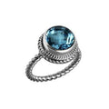 Sterling silver ring with a round Blue Topaz Quartz and rope-style band design.