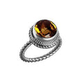 Sterling silver ring with a round Citrine Quartz and rope-style band design.