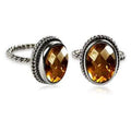 Sterling silver oval Citrine Quartz ring with faceted stone and rope bezel, wholesale jewelry from Indonesia.