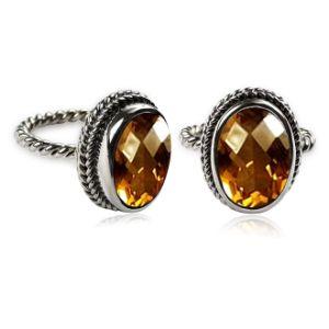 Sterling silver oval Citrine Quartz ring with faceted stone and rope bezel, wholesale jewelry from Indonesia.