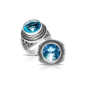 Sterling silver handcrafted Bali ring with round Blue Topaz Quartz and rope scroll design.