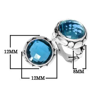 Wholesale sterling silver ring with round-cut Blue Topaz Quartz in a bold Balinese bezel design.