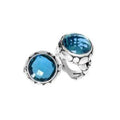 Wholesale sterling silver ring with round-cut Blue Topaz Quartz in a bold Balinese bezel design.