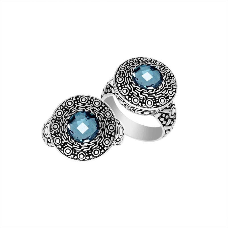 Wholesale sterling silver ring with round Blue Topaz Quartz in an ornate engraved Balinese bezel.