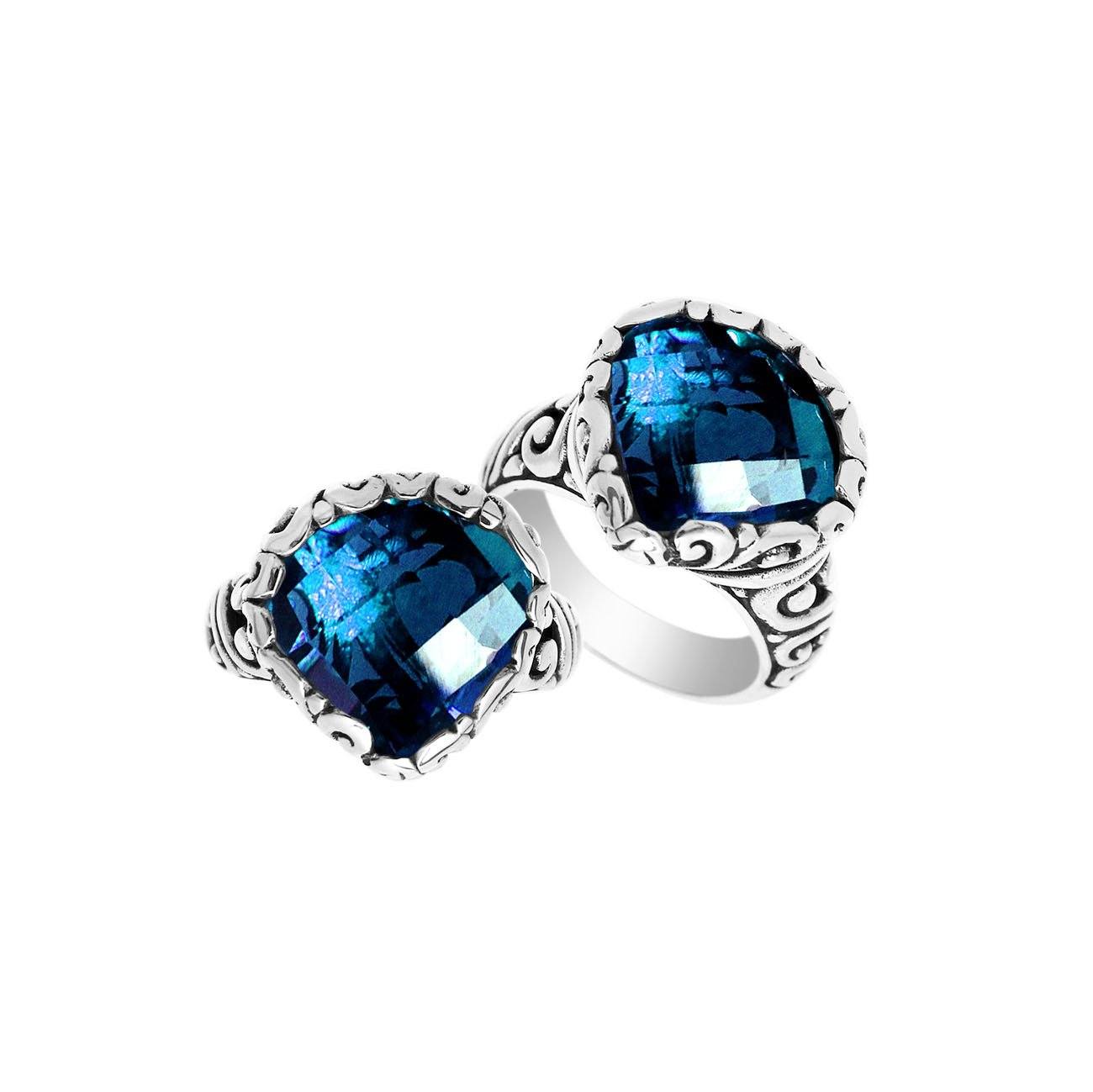 Wholesale sterling silver ring with cushion-cut London Blue Topaz Quartz and Balinese scrollwork.