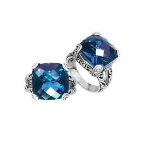 Wholesale 925 Sterling Silver cushion ring with faceted London Blue Topaz Quartz, handcrafted in Bali with oan rnate scroll design